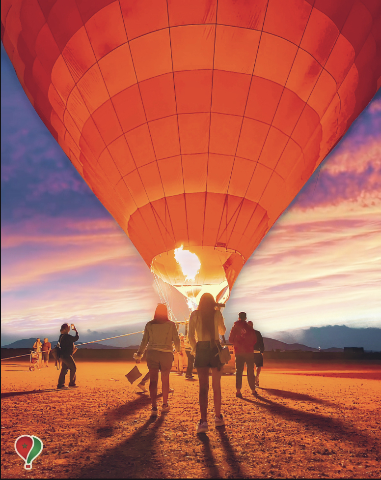 Flame from gas burner in orange hot air balloon